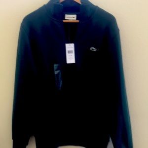 Lacoste sweater in Hunter green. Never worn